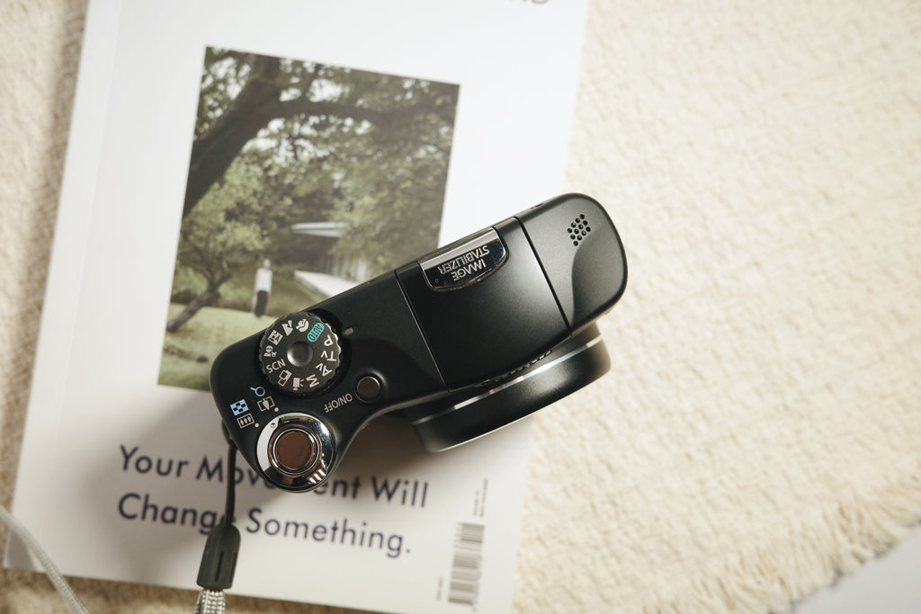Canon sx100is with box