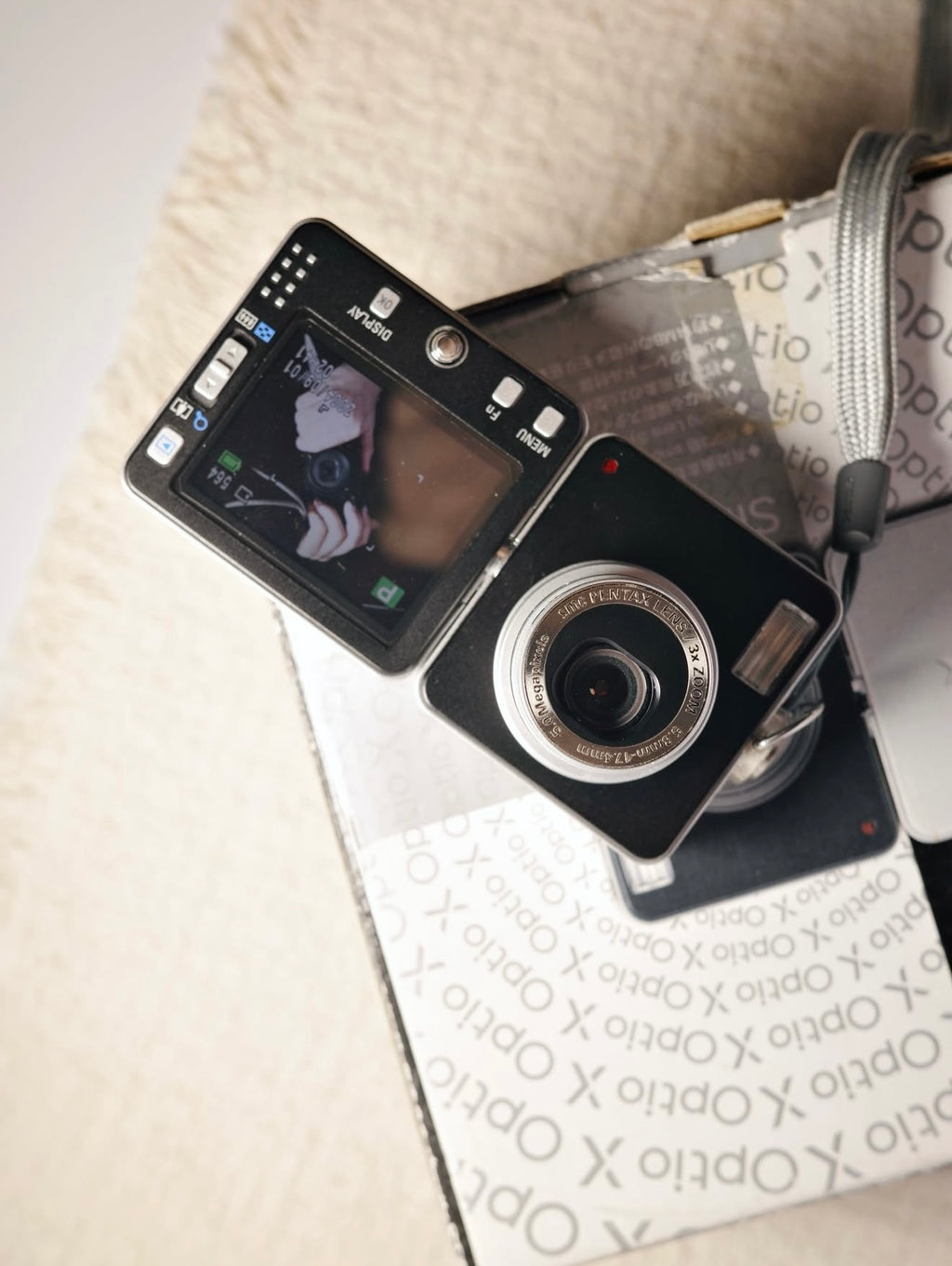 Pentax optio X搖頭機